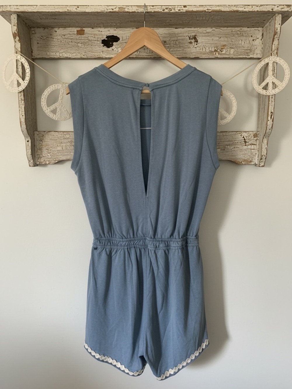 Umgee Light Denim Mineral Washed French Terry Peace Sign Romper.
Size Small
NWT - Picture 2 of 3